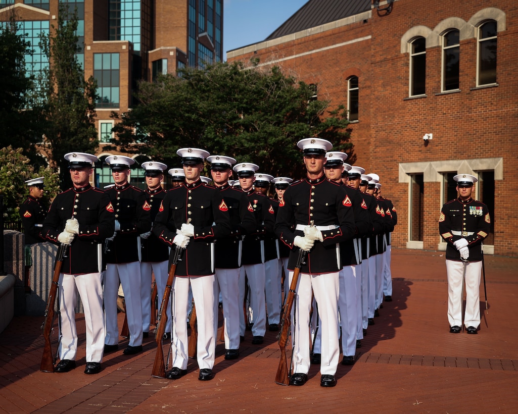 U.S. Marines with the United States Marine Corps Silent Drill Platoon, Marine Barracks Washington, prepare to perform during the 250th Marine Corps Birthday Ceremony at City Hall in Murfreesboro, near Nashville, Tenn., June 4, 2025. The Silent Drill Platoon, a 24-Marine unit known for executing rifle drill with unmatched precision and without verbal commands, represents the highest standards of discipline and professionalism in the Marine Corps. Their performance is part of Marine Week Nashville 2025, celebrating the Corps’ 250-year legacy and commitment to engaging with communities across the nation. (U.S. Marine Corps photo by Lance Cpl. Brynn L. Bouchard)