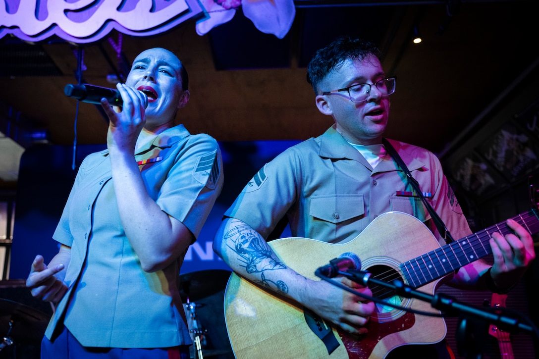 U.S. Marine Corps Sgt. Elizabeth Morino and Cpl. Anthony Russo, Marine musicians with 2nd Marine Aircraft Wing band, Special Purpose Marine Air Ground Task Force-250, perform at Tootsies Orchid Lounge during Marine Week Nashville, in Nashville, Tennessee, June 6, 2025. Tootsies hosted the 2nd MAW band as a way to show support for the Marine Corps. Throughout 2025, Marines across the globe will celebrate the 250th birthday of the Corps, commemorating, service, sacrifice, and priding themselves on living ‘Semper Fidelis’ or ‘Always Faithful’ to their nation and to each other. (U.S. Marine Corps photo by Cpl. Vincent Needham)