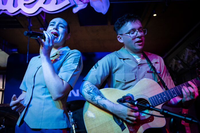 U.S. Marine Corps Sgt. Elizabeth Morino and Cpl. Anthony Russo, Marine musicians with 2nd Marine Aircraft Wing band, Special Purpose Marine Air Ground Task Force-250, perform at Tootsies Orchid Lounge during Marine Week Nashville, in Nashville, Tennessee, June 6, 2025. Tootsies hosted the 2nd MAW band as a way to show support for the Marine Corps. Throughout 2025, Marines across the globe will celebrate the 250th birthday of the Corps, commemorating, service, sacrifice, and priding themselves on living ‘Semper Fidelis’ or ‘Always Faithful’ to their nation and to each other. (U.S. Marine Corps photo by Cpl. Vincent Needham)
