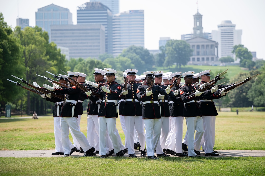 U.S. Marines with the Silent Drill Platoon, Marine Barracks Washington, perform during a wreath laying ceremony at Bicentennial Park in Nashville, Tennessee, June 4, 2025. Marines came out to the park to engage with the community, and to pay homage to Marines past and present. Throughout 2025, Marines across the globe will celebrate the 250th birthday of the Corps, commemorating, service, sacrifice, and priding themselves on living ‘Semper Fidelis’ or ‘Always Faithful’ to their nation and to each other. (U.S. Marine Corps photo by Cpl. Vincent Needham)