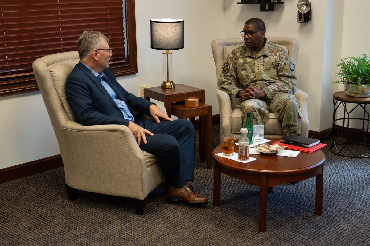 U.S. Air Force Gen. Randall Reed, commander of U.S. Transportation Command, welcomes Secretary of the Air Force Troy Meink to USTRANSCOM headquarters at Scott Air Force Base, Illinois. Meink visited Scott AFB as part of an immersion tour to gain insight into how the Department of the Air Force supports the mission and operations of the command. (Photo by Brien Vorhees)