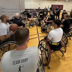 Team Army getting ready to start day one of their wheelchair basketball practice.