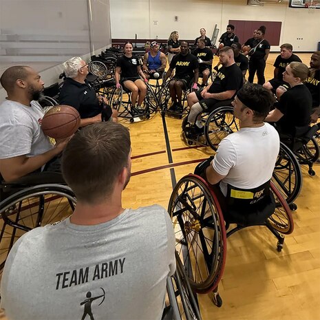Team Army getting ready to start day one of their wheelchair basketball practice.