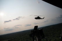 A U.S. Marine Corps AH-1Z Viper helicopter flies in tandem with a UH-1Y Venom helicopter during Marine Week Nashville in Nashville, Tennessee, June 1, 2025. Founded on November 10, 1775, the United States Marine Corps has served our nation honorably in every clime and place for 250 years. Throughout 2025, Marines across the globe will celebrate the 250th birthday of the Corps, commemorating, service, sacrifice, and priding themselves on living ‘Semper Fidelis’ or ‘Always Faithful’ to their nation and to each other. (U.S. Marine Corps photo by Cpl. Vincent Needham)