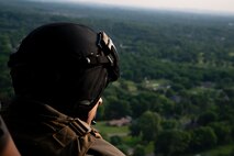 U.S. Marine Corps Gunnery Sgt. Taylor Gunderson, an aircrew chief with Marine Light Attack Helicopter Squadron 773, 4th Marine Aircraft Wing, Marine Forces Reserve, conducts a flyover for Marine Week Nashville in Nashville, Tennessee, June 1, 2025. Founded on November 10, 1775, the United States Marine Corps has served our nation honorably in every clime and place for 250 years. Throughout 2025, Marines across the globe will celebrate the 250th birthday of the Corps, commemorating, service, sacrifice, and priding themselves on living ‘Semper Fidelis’ or ‘Always Faithful’ to their nation and to each other. Gunderson is a native of Pennsylvania. (U.S. Marine Corps photo by Cpl. Vincent Needham)