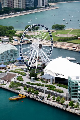 U.S. Marines with Marine Light Attack Helicopter Squadron (HMLA) 773, Marine Aircraft Group 49, 4th Marine Aircraft Wing, fly over the Centennial Wheel during Marine Week Chicago, July 11, 2025. Throughout 2025, Marines across the globe will celebrate the 250th birthday of the Corps, commemorating service, sacrifice, and priding themselves on living ‘Semper Fidelis’ or ‘Always Faithful’ to their nation and to each other. Vincent is a native of Lake Charles, Louisiana. (U.S. Marine Corps photo by Cpl. Samantha Pollich)