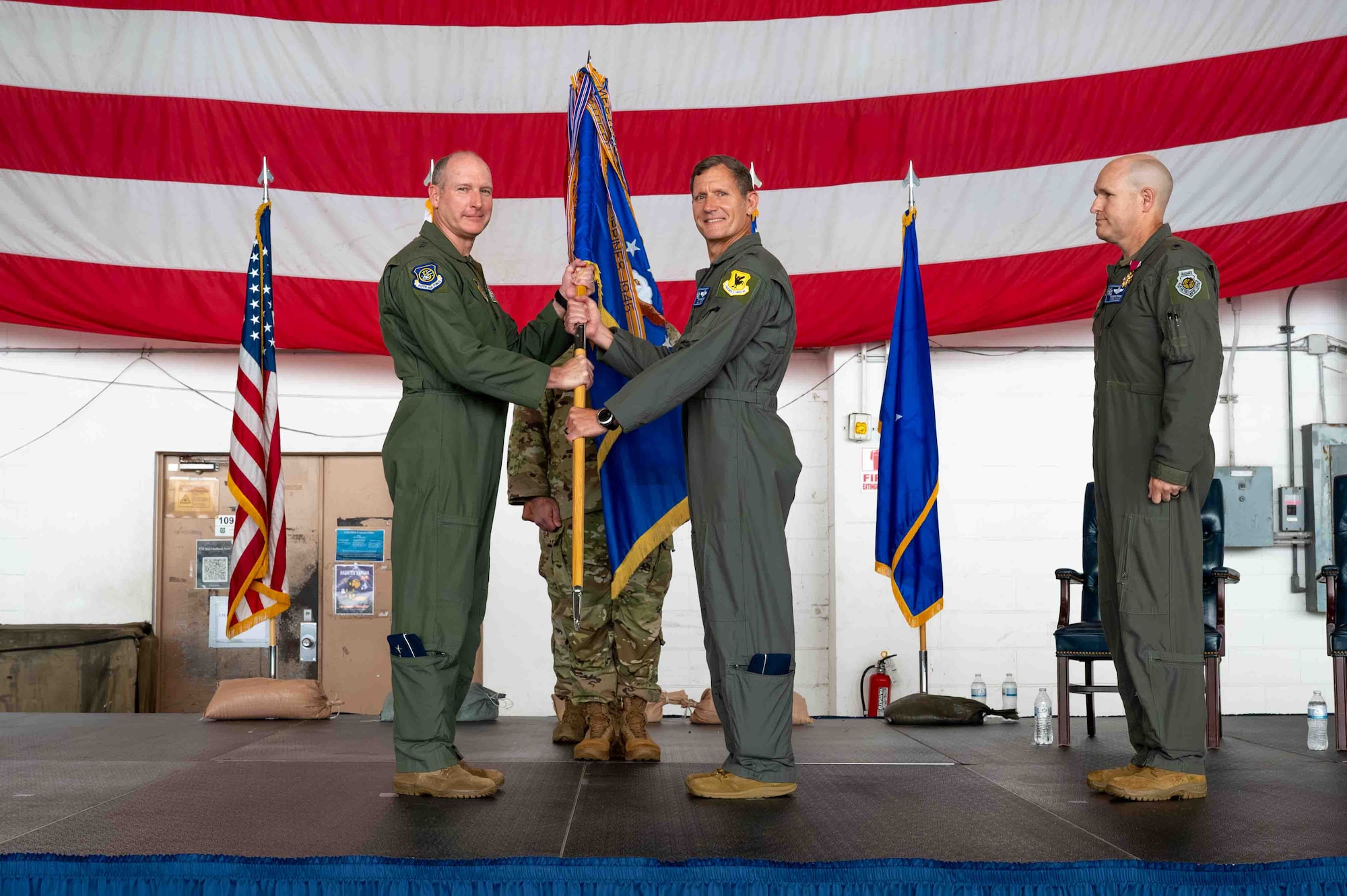 Service member passes guidon to next leadership.