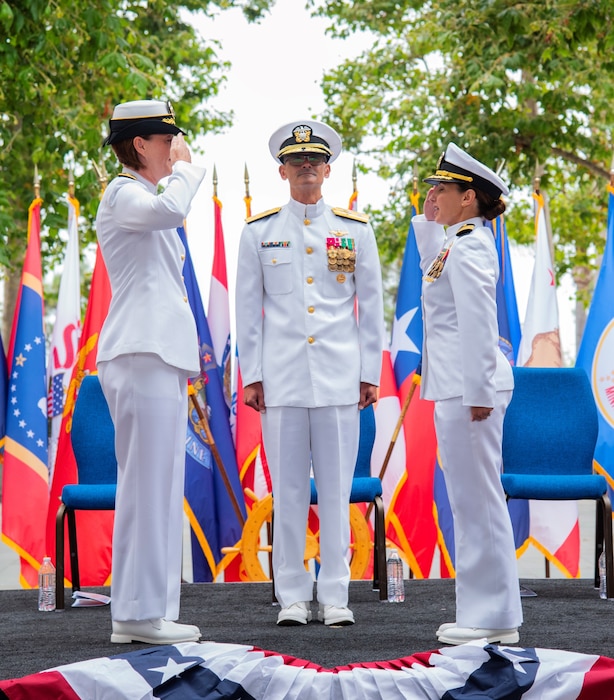 Outgoing Navy Medicine Readiness and Training Command Camp Pendleton Commander Capt. Jenny Burkett (left) salutes incoming NMRTC Camp Pendleton Commander Capt. Virginia Damin (right) during the change of command ceremony held July 11, 2025, in the Medal Honor Promenade of Naval Hospital Camp Pendleton. Naval Medical Forces Pacific Commander Rear Adm. Guido Valdes presided over the event and served as the reviewing officer ensuring the formal transfer of authority and responsibility for the command. Burkett will transfer to the Office of the Deputy Navy Surgeon General in Falls Church, Va., and Damin comes to NMRTC Camp Pendleton from her previous position as the executive officer of NMRTC Guam and deputy director of Naval Hospital Guam. For 250 years, Navy Medicine – represented by more than 44,000 highly-trained military and civilian healthcare professionals – has delivered quality healthcare and enduring expeditionary medical support to the warfighter on, below, and above the sea, and ashore.