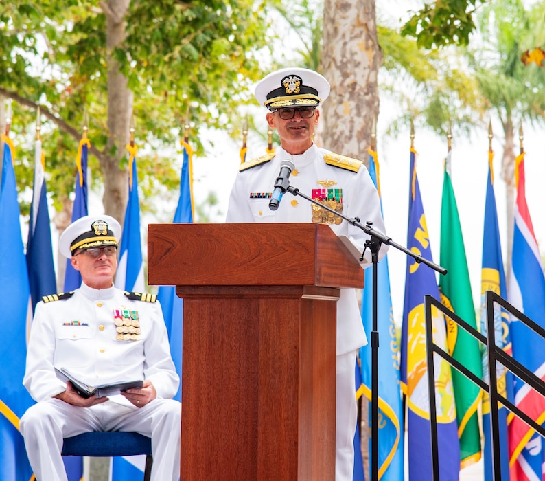 Naval Medical Forces Pacific Commander Rear Adm. Guido Valdes provides remarks during the Navy Medicine Readiness and Training Command Camp Pendleton change of command ceremony held July 11, 2025, in the Medal of Honor Promenade of Naval Hospital Camp Pendleton. During the ceremony, Capt. Jenny Burkett was relieved by Capt. Virginia Damin as the commander of NMRTC Camp Pendleton and director of NHCP. For 250 years, Navy Medicine – represented by more than 44,000 highly-trained military and civilian healthcare professionals – has delivered quality healthcare and enduring expeditionary medical support to the warfighter on, below, and above the sea, and ashore.