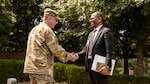 U.S. Army Maj. Gen. Todd Hunt, the Adjutant General of North Carolina and His Excellency Mpho Churchill O. Mophuting, the Republic of Botswana’s Ambassador to the United States, greet each other during an official state visit to the Joint Force Headquarters in Raleigh, North Carolina, May 22, 2025.