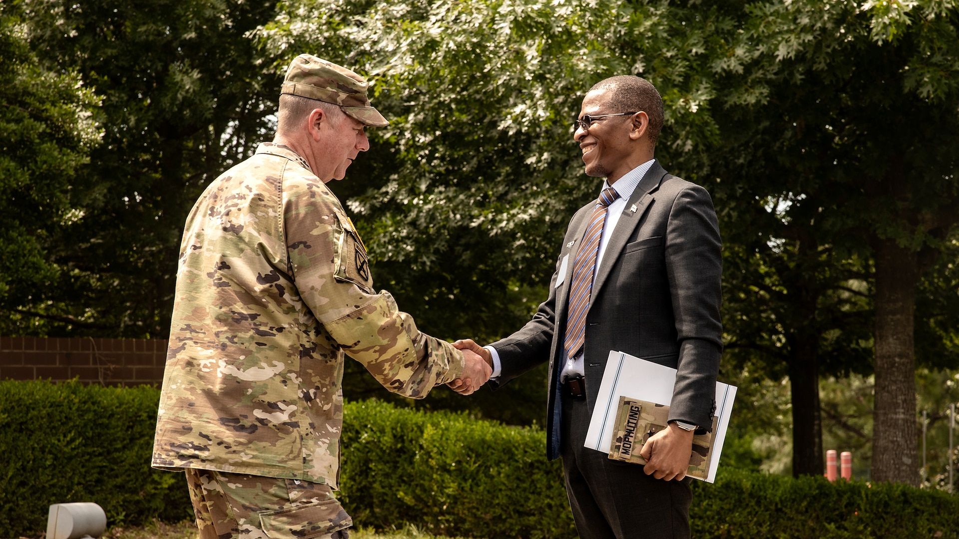 U.S. Army Maj. Gen. Todd Hunt, the Adjutant General of North Carolina and His Excellency Mpho Churchill O. Mophuting, the Republic of Botswana’s Ambassador to the United States, greet each other during an official state visit to the Joint Force Headquarters in Raleigh, North Carolina, May 22, 2025.