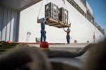 250709-N-BP862-1140 MANTA, Ecuador (July 9, 2025) Hospitalman Christopher Olheiser and Logistics Specialist 3rd class Daniel Clerge, both assigned to the Mercy-class hospital ship USNS Comfort (T-AH 20), load medical supplies onto Comfort in Manta, Ecuador during Continuing Promise 2025, July 9, 2025. Continuing Promise 2025 is the 16th iteration of the U.S. 4th Fleet/U.S. Naval Forces Southern Command-led mission since 2007, which aims to foster goodwill, strengthen existing partnerships with partner nations, and form new partnerships between host nations, non-federal entities, and international organizations. (U.S. Navy photo by Mass Communication Specialist 2nd Class Thomas Boatright)