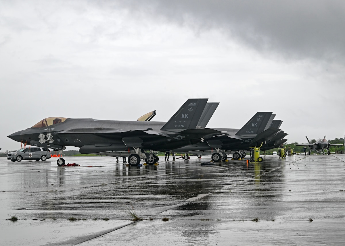 F-35s parked on flightline.