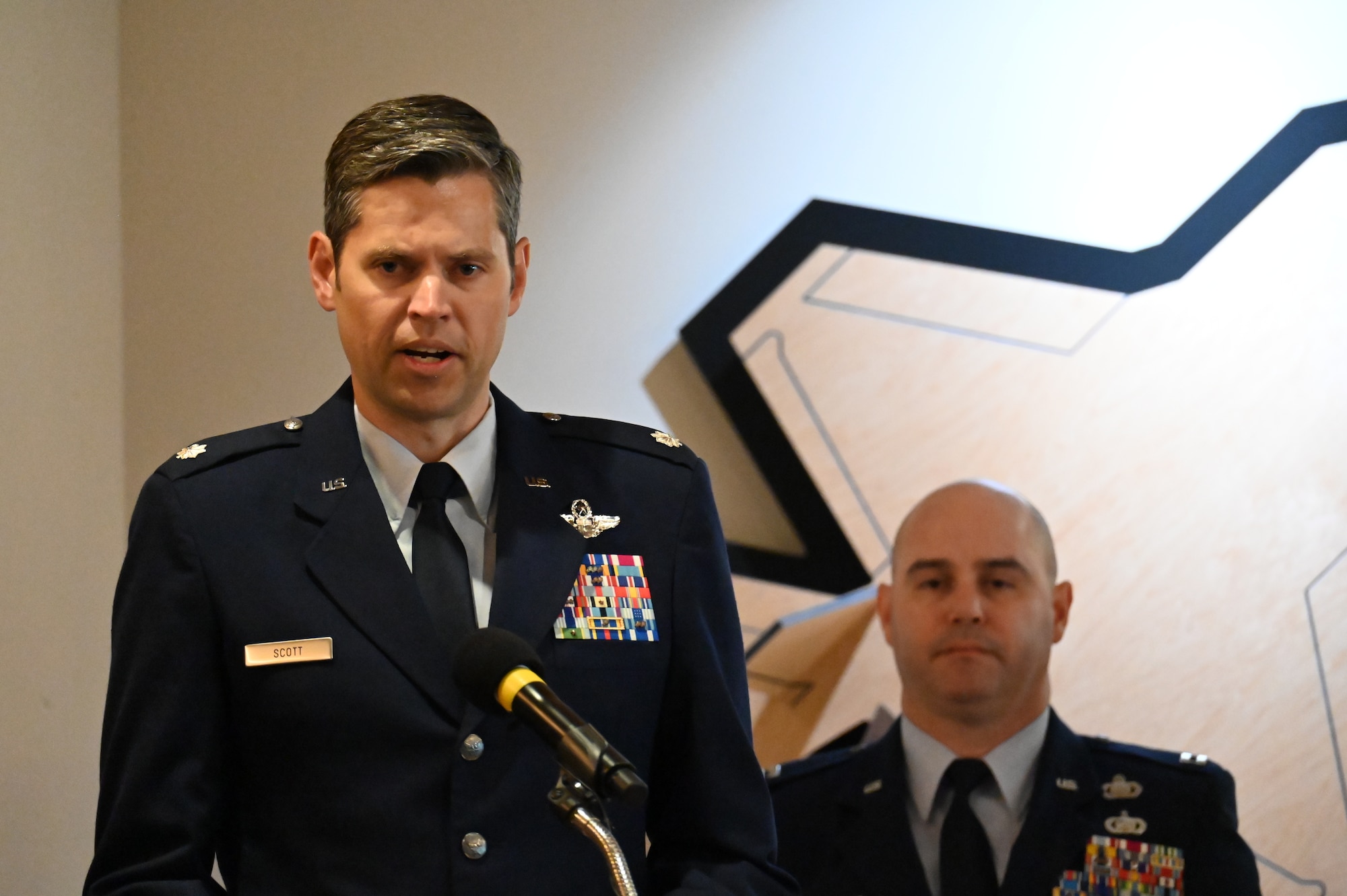 New commander addresses audience from the podium