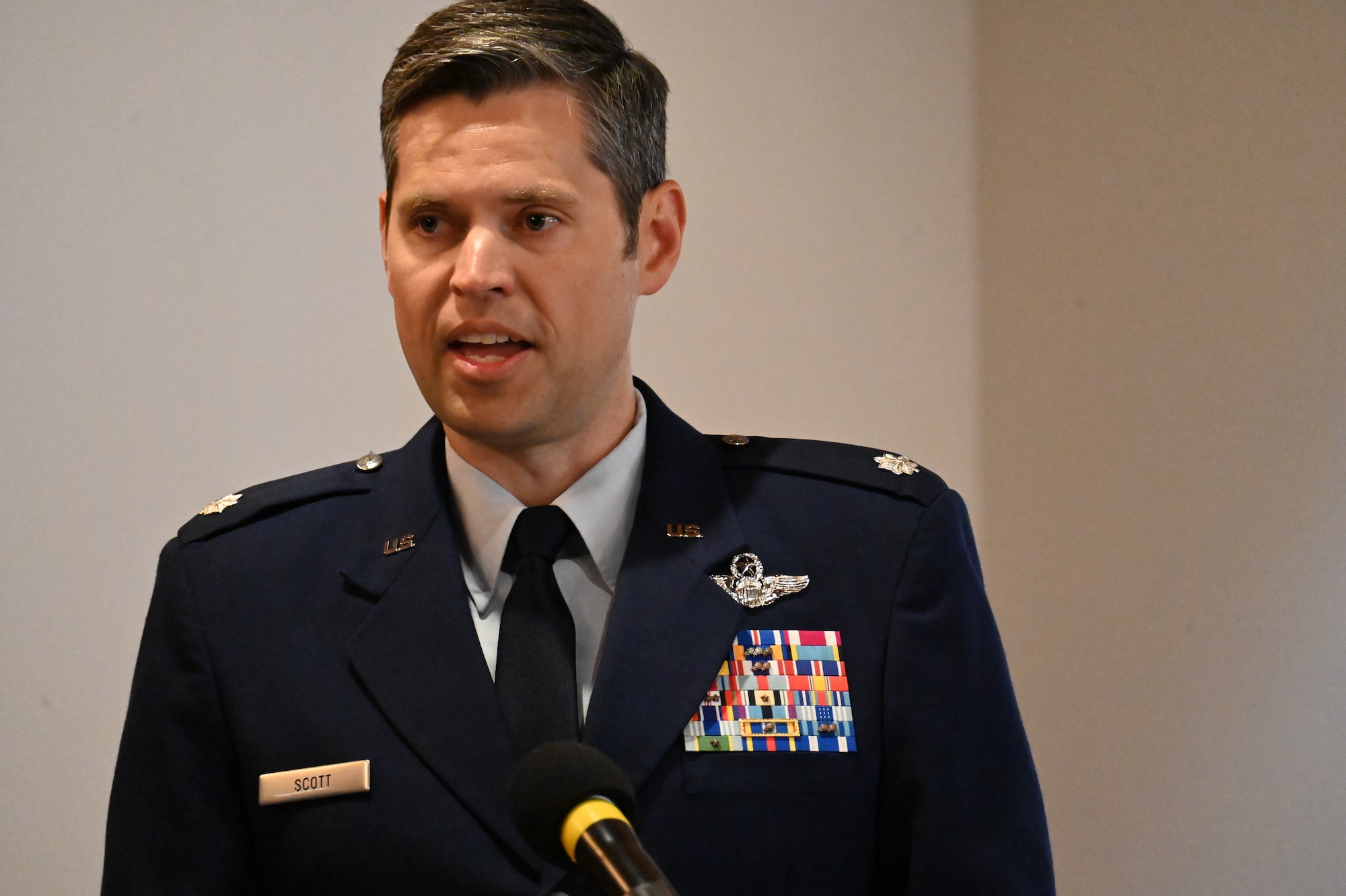 New commander addresses audience from the podium