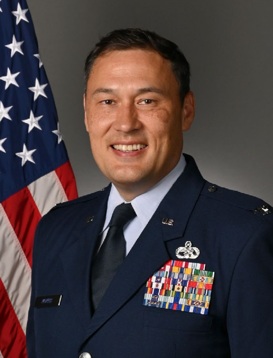 Man posing for an official photo