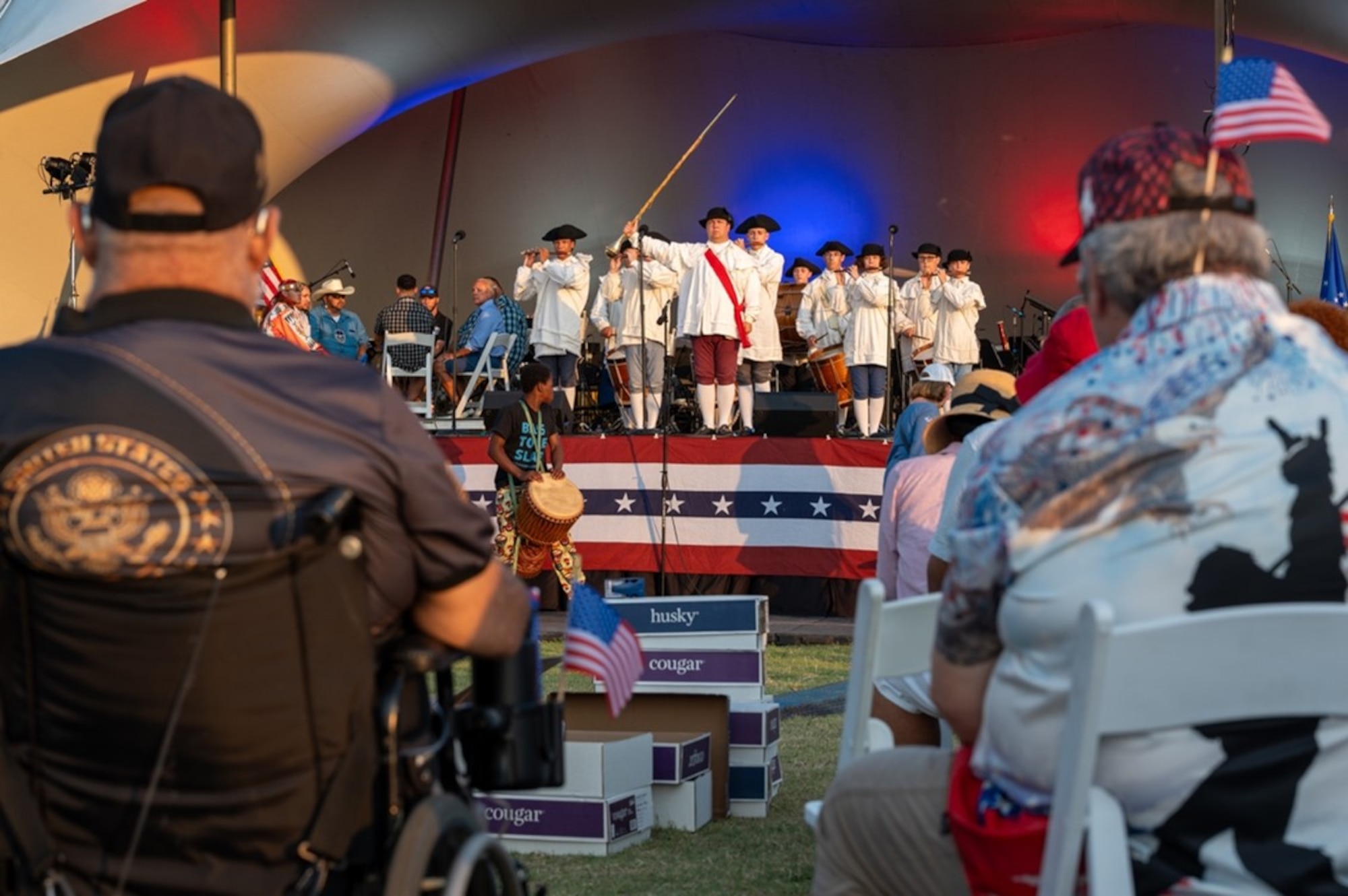 Attendees watch a band perform on stage. (U.S. Air Force photo by Airman 1st Class Donnell Ramsey)