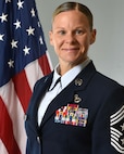 Female posing for an official photo
