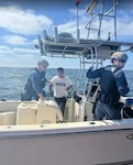 SAN DIEGO - A San Francisco based MSST boarding team interdicts a 20-foot smuggling vessel with three aliens aboard approximately 6 miles off Imperial Beach, California July 12, 2025. The vessel initially stopped but attempted to flee; Coast Guard crews used warning and pepper ball rounds to gain compliance and safely take control. U.S. Coast Guard photo.