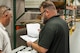 Photo of people reviewing documents
