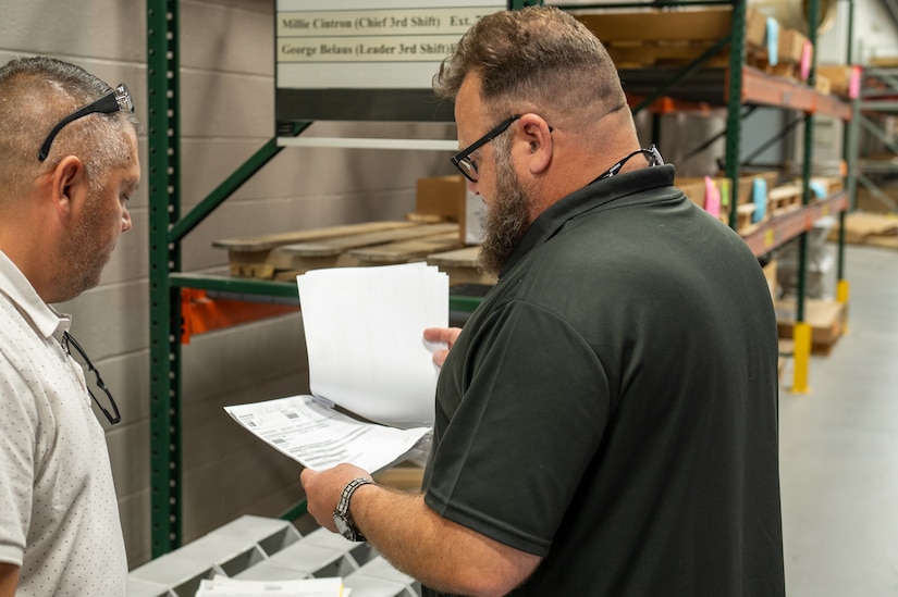 Photo of people reviewing documents
