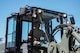 Airman 1st Class James Davies, 5th Logistics Readiness Squadron (5LRS) transportation management organization inbound cargo technician, drives a forklift to a C-5M Super Galaxy at Minot Air Force Base, North Dakota, July 1, 2025. The 5LRS air transportation function helps supply and load gear needed for missions onto aircraft. (U.S. Air Force photo by Airman 1st Class Wesley Davies)