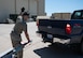 Senior Airman Jonathan Gonzalez-Rodriguez, 5th Logistics Readiness Squadron (5LRS)  air transportation specialist, guides a truck into place to attach a trailer at Minot Air Force Base, North Dakota, July 1, 2025. The 5LRS air transportation function at Minot AFB plays a critical role in ensuring mission success by loading and moving essential cargo to support global operations. (U.S. Air Force photo by Airman 1st Class Wesley Davies)