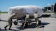 Airmen from the 5th Logistics Readiness Squadron (5LRS) help push a B-52H Stratofortress engine into place to be put onto a C-5M Super Galaxy at Minot Air Force Base, North Dakota, July 1, 2025. The 5LRS air transportation function at Minot AFB plays a critical role in ensuring mission success by loading and moving essential cargo to support global operations. (U.S. Air Force photo by Airman 1st Class Wesley Davies)