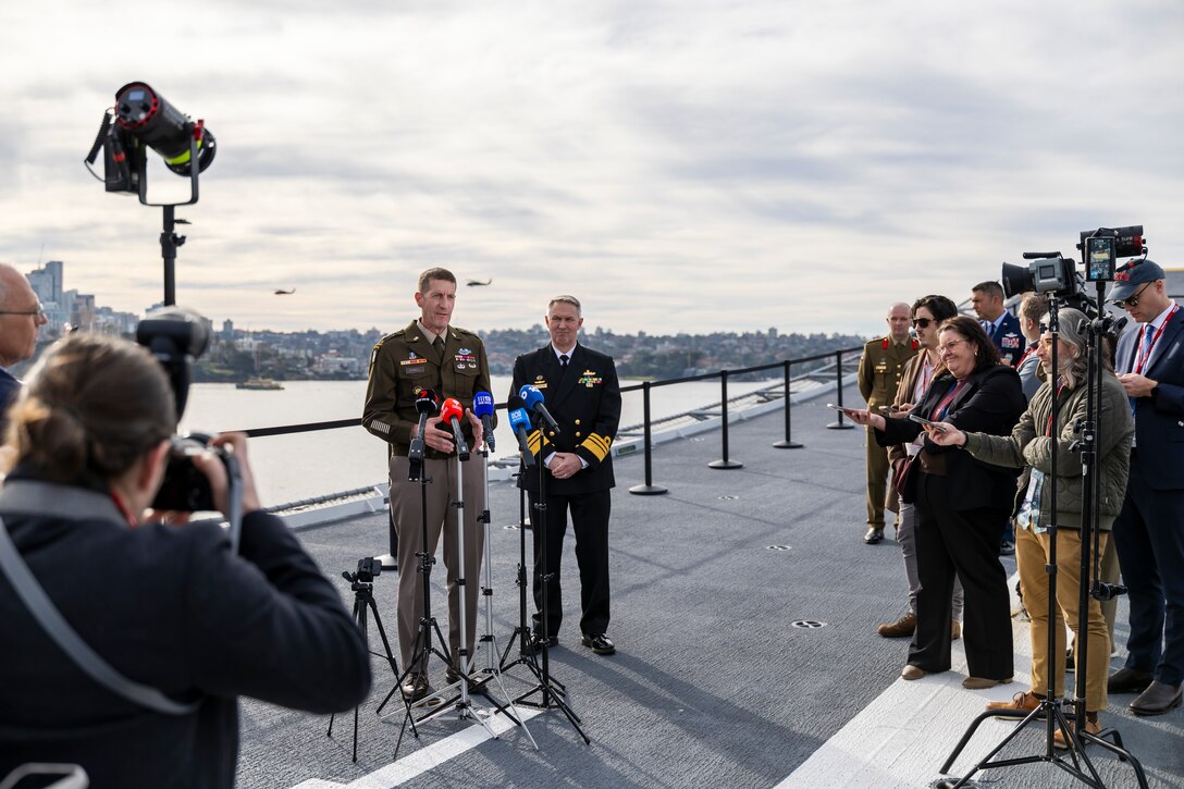 Lieutenant General Joel Vowell, Deputy Commanding General for U.S. Army Pacific (USARPAC) and Australian Defence Force Chief of Joint Operations, Vice Admiral Justin Jones, AO, CSC, RAN address the media at the opening ceremony for Exercise Talisman Sabre 25 onboard HMAS Adelaide in Sydney, New South Wales. *** Local Caption *** Exercise Talisman Sabre 2025 is being conducted across Australia from 13 July to 04 August.

More than 35,000 military personnel from 19 nations will participate in Talisman Sabre 2025, primarily in Queensland but also in Western Australia, the Northern Territory, New South Wales, and for the first time, offshore activities will be conducted in Papua New Guinea.

Talisman Sabre is the largest Australia-US bilaterally planned, multilaterally conducted exercise and a key opportunity to work with likeminded partners from across the region and around the world. Canada, France, Fiji, Germany, India, Indonesia, Japan, Netherlands, New Zealand, Norway, Papua New Guinea, Philippines, Republic of Korea, Singapore, Thailand, Tonga and the United Kingdom are all participating in Talisman Sabre 2025.

Occurring every two years, Talisman Sabre reflects the closeness of our alliance and strength of our enduring military relationship with the United States and our commitment to working with likeminded partners in the region. Now in its eleventh iteration, Talisman Saber provides an opportunity to exercise our combined capabilities to conduct high-end, multi-domain warfare, to build and affirm our military-to-military ties and interoperability, and strengthen our strategic partnerships.