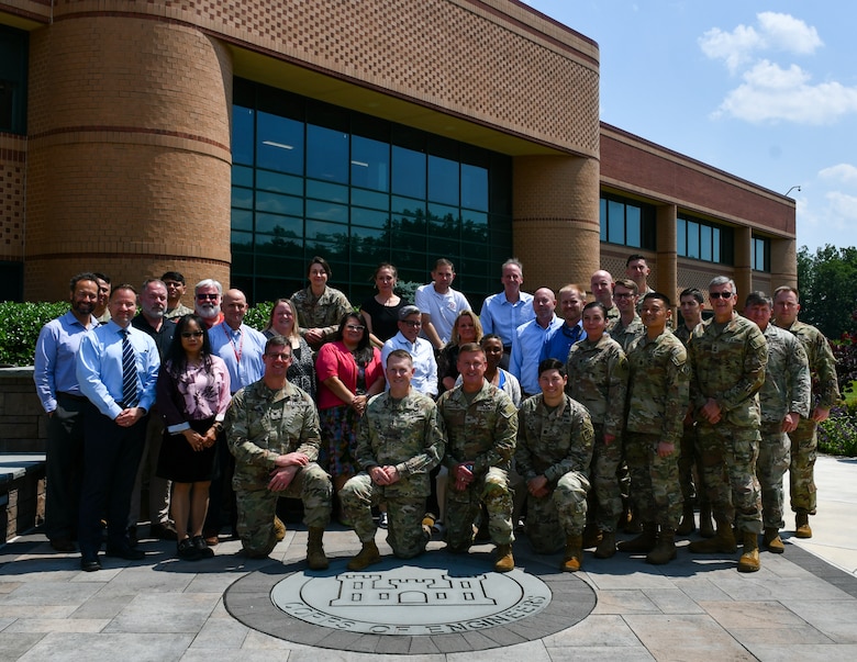 U.S. Army Maj. Gen. David C. Hill, Commandant of the U.S. Army War College and former U.S. Army Corps of Engineers Transatlantic Division commander, poses for a group photo with the Transatlantic Division staff following a special commemorative event on June 11 at the division headquarters in Winchester, Va.