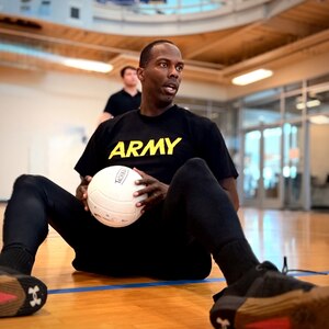 Staff Sgt. Thompson getting ready to serve the game point.