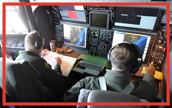 Coast Guard Petty Officer 1st Class Lee Christensen and Petty Officer 3rd Class Cody Blakley, avionics electrical technicians at Air Station Elizabeth City, North Carolina, practice using the radar aboard an HC-130 Hercules airplane over North Carolina's coast, Jan. 8, 2019. Christensen trained Blakley in using the radar to spot fixed and unfixed objects, using the camera to record footage of said objects, and other procedures required of a mission system operator. (U.S. Coast Guard photo by Petty Officer 2nd Class Corinne Zilnicki)