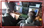 Coast Guard Petty Officer 1st Class Lee Christensen and Petty Officer 3rd Class Cody Blakley, avionics electrical technicians at Air Station Elizabeth City, North Carolina, practice using the radar aboard an HC-130 Hercules airplane over North Carolina's coast, Jan. 8, 2019. Christensen trained Blakley in using the radar to spot fixed and unfixed objects, using the camera to record footage of said objects, and other procedures required of a mission system operator. (U.S. Coast Guard photo by Petty Officer 2nd Class Corinne Zilnicki)