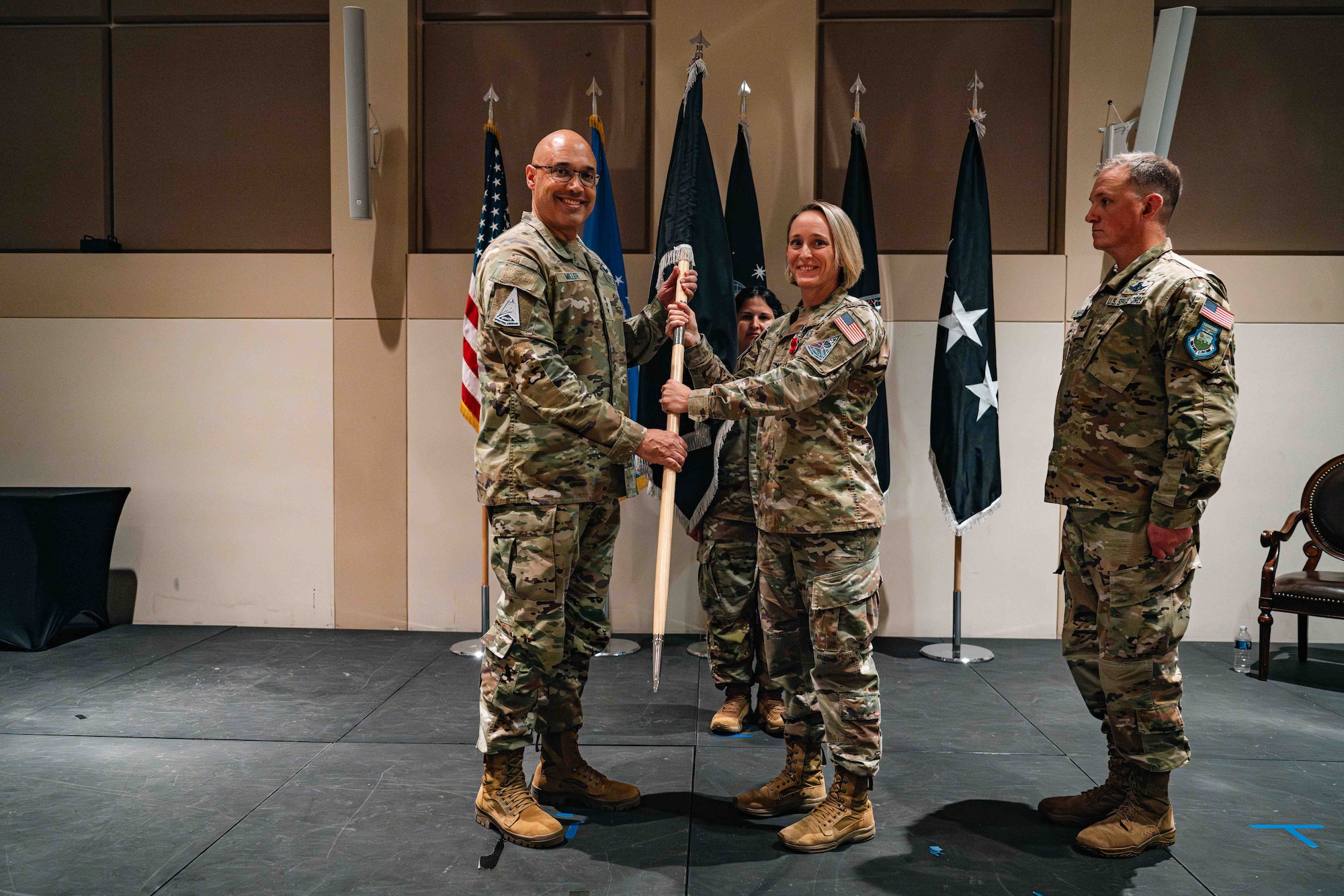 woman hands man guidon