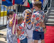 JOINT BASE PEARL HARBOR-HICKAM, Hawaii (July 12, 2025) - Cmdr. Dustin Kraemer, commanding officer of the Los Angeles-class fast-attack submarine USS Toledo (SSN 769), greets his family as Toledo arrives at Joint Base Pearl Harbor-Hickam during its change of homeport, July 12, 2025. Toledo is assigned to Submarine Squadron 7 and is capable of supporting various missions, including anti-submarine warfare, anti-surface ship warfare, strike warfare, and intelligence, surveillance, and reconnaissance. (U.S. Navy photo by Mass Communication Specialist 1st Class Scott Barnes)