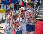 JOINT BASE PEARL HARBOR-HICKAM, Hawaii (July 12, 2025) - Cmdr. Dustin Kraemer, commanding officer of the Los Angeles-class fast-attack submarine USS Toledo (SSN 769), greets his family as Toledo arrives at Joint Base Pearl Harbor-Hickam during its change of homeport, July 12, 2025. Toledo is assigned to Submarine Squadron 7 and is capable of supporting various missions, including anti-submarine warfare, anti-surface ship warfare, strike warfare, and intelligence, surveillance, and reconnaissance. (U.S. Navy photo by Mass Communication Specialist 1st Class Scott Barnes)