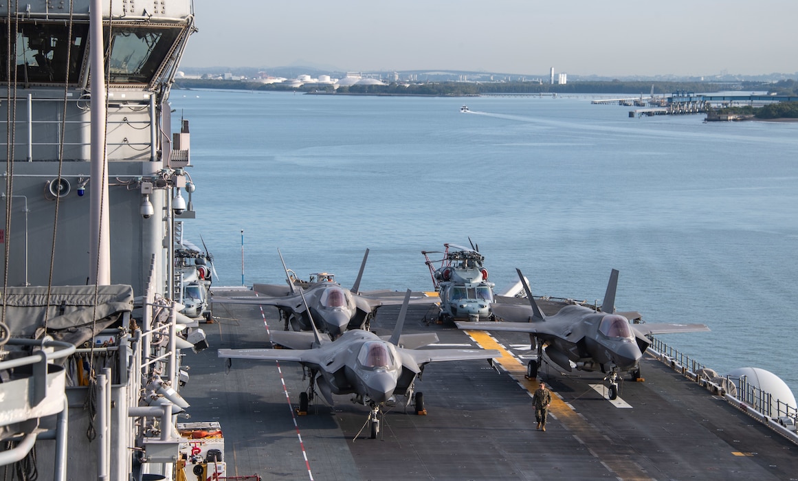The forward-deployed amphibious assault ship USS America (LHA 6) pulls into Brisbane, Australia, for a scheduled port visit July 9. America, lead ship of the America Amphibious Ready Group, is operating in the U.S. 7th Fleet area of operations.