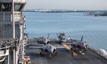 The forward-deployed amphibious assault ship USS America (LHA 6) pulls into Brisbane, Australia, for a scheduled port visit July 9. America, lead ship of the America Amphibious Ready Group, is operating in the U.S. 7th Fleet area of operations.