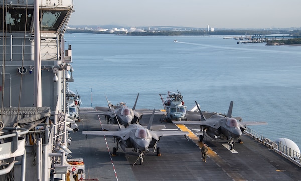The forward-deployed amphibious assault ship USS America (LHA 6) pulls into Brisbane, Australia, for a scheduled port visit July 9. America, lead ship of the America Amphibious Ready Group, is operating in the U.S. 7th Fleet area of operations.