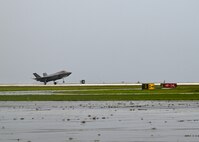 F-35 taking off from runway.
