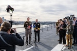 Lieutenant General Joel Vowell, Deputy Commanding General for U.S. Army Pacific (USARPAC) and Australian Defence Force Chief of Joint Operations, Vice Admiral Justin Jones, AO, CSC, RAN address the media at the opening ceremony for Exercise Talisman Sabre 25 onboard HMAS Adelaide in Sydney, New South Wales.