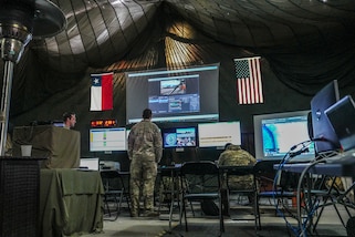 U.S. and Chilean Air Commandos work together to process intelligence video from multiple platforms, including the U-28A Draco, in Rancagua, Chile, June 2, 2025, as part of exercise SOUTHERN STAR 25.