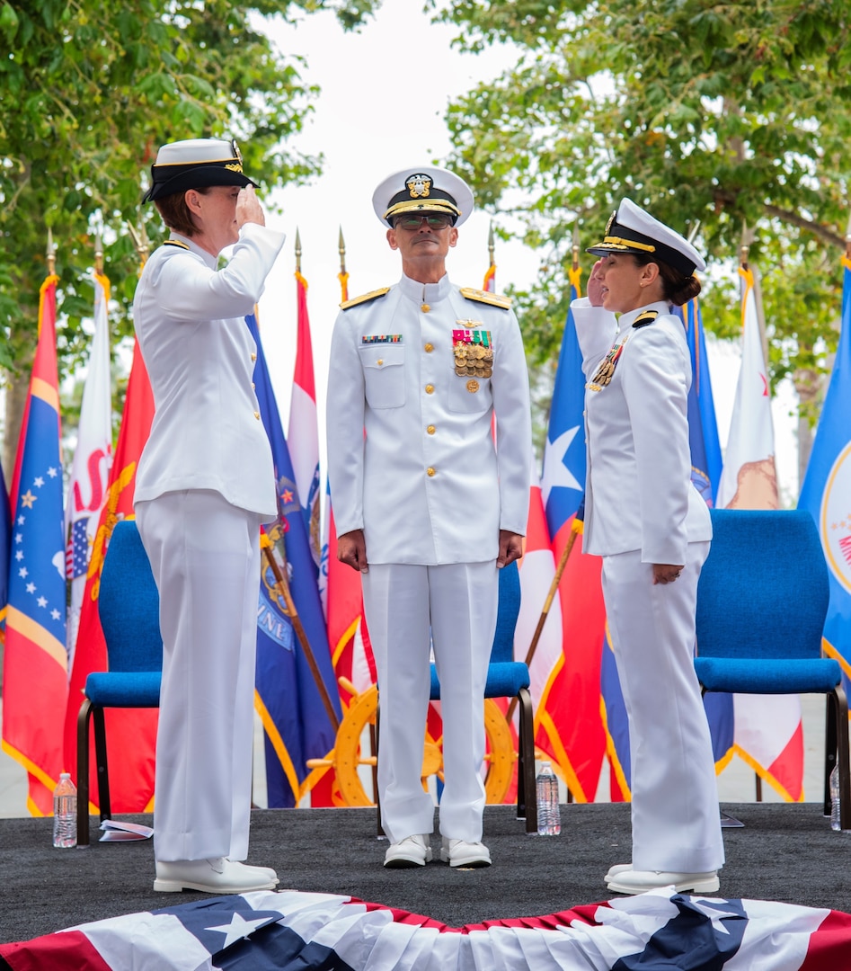 Outgoing Navy Medicine Readiness and Training Command Camp Pendleton Commander Capt. Jenny Burkett (left) salutes incoming NMRTC Camp Pendleton Commander Capt. Virginia Damin (right) during the change of command ceremony held July 11, 2025, in the Medal Honor Promenade of Naval Hospital Camp Pendleton. Naval Medical Forces Pacific Commander Rear Adm. Guido Valdes presided over the event and served as the reviewing officer ensuring the formal transfer of authority and responsibility for the command. Burkett will transfer to the Office of the Deputy Navy Surgeon General in Falls Church, Va., and Damin comes to NMRTC Camp Pendleton from her previous position as the executive officer of NMRTC Guam and deputy director of Naval Hospital Guam. For 250 years, Navy Medicine – represented by more than 44,000 highly-trained military and civilian healthcare professionals – has delivered quality healthcare and enduring expeditionary medical support to the warfighter on, below, and above the sea, and ashore.