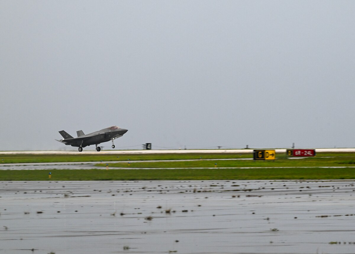 F-35 taking off from runway.