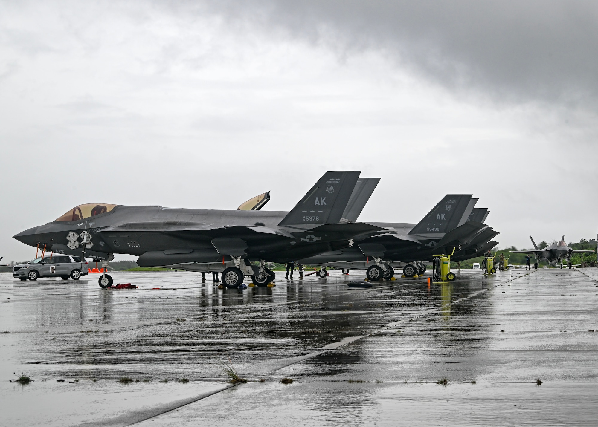 F-35s parked on flightline.