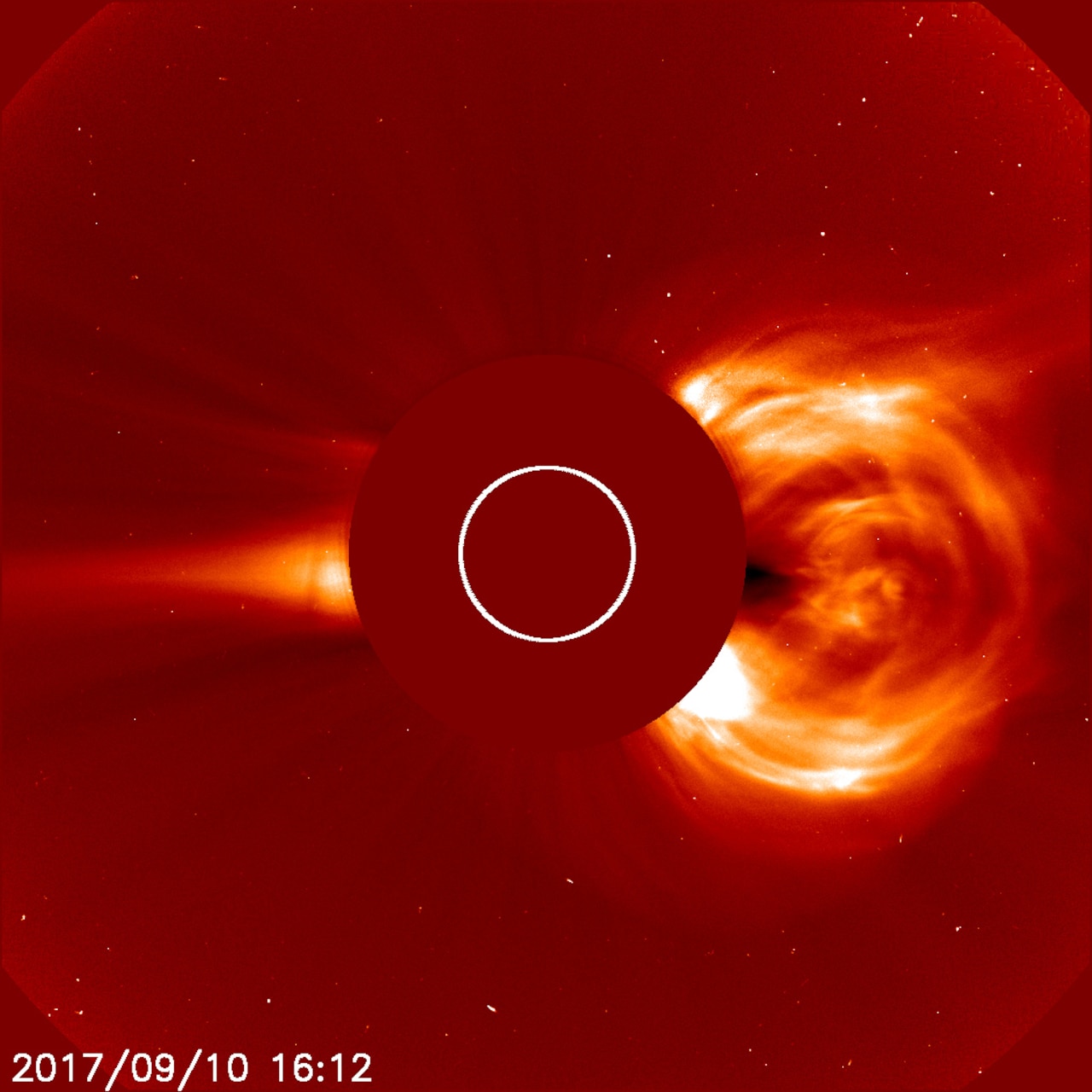 An image from the U.S. Naval Research Laboratory’s (NRL) Large Angle and Spectrometric Coronagraph Experiment (LASCO) C2 coronagraph observing a fast coronal mass ejection, as mentioned in the study, on September 10, 2017. The Sun is at the center of the image, hidden by a solid disk that blocks blinding sunlight and enables observations of the much fainter solar corona.