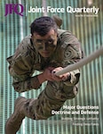 Soldier moves across rope during Wolf Blitz 25 at Grafenwoehr Training Area, Germany.