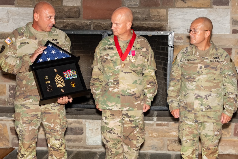 Command Sgt. Maj. Andrew Campbell, who most recently served as the Pennsylvania Army National Guard command sergeant major, is honored during a retirement ceremony conducted June 12 at Fort Indiantown Gap’s Keystone Conference Center. Campbell, who retired after 33 years of service, enlisted into the active-duty Army in 1992. He began his position as the Pennsylvania Army National Guard command sergeant major July 1, 2021, in which he was the principal advisor to the deputy adjutant general-Army and staff on matters pertaining to the enlisted Soldiers of the Pennsylvania Army National Guard. (Pennsylvania National Guard photo by Wayne V. Hall)