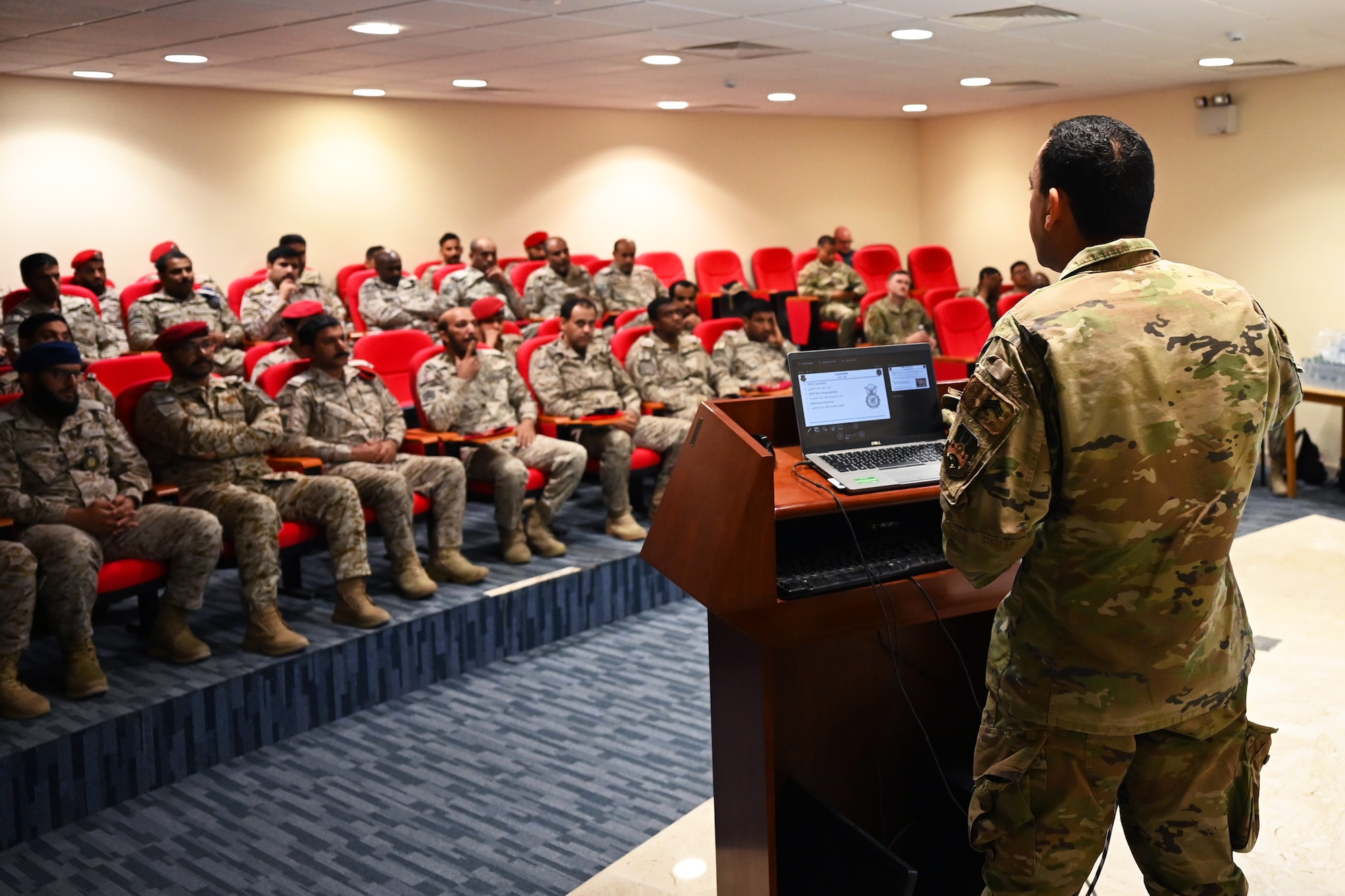 Airman translates a powerpoint presentation