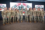 Gen. Steven Nordhaus, chief of the National Guard Bureau, Senior Enlisted Advisor John Raines III, SEA to the chief of the National Guard Bureau, Maj. Gen. Janeen Birckhead, the Adjutant General of Maryland and Command Sgt. Maj. David C. Harry, senior enlisted leader of the Maryland Army National Guard, pose for a photo with competitors in the Army National Guard’s 2025 Best Warrior Competition on July 12, 2025, at Under Armour Headquarters in Baltimore, Maryland. The Army National Guard’s 2025 National Best Warrior Competition, hosted by the Maryland National Guard, is an annual event that unites Soldiers and Noncommissioned Officers from seven regions across the United States. Competitors face a demanding series of physical and mental challenges designed to test their military expertise, resilience, and dedication to the Warrior Ethos for the opportunity to advance to Best Squad Competition.
